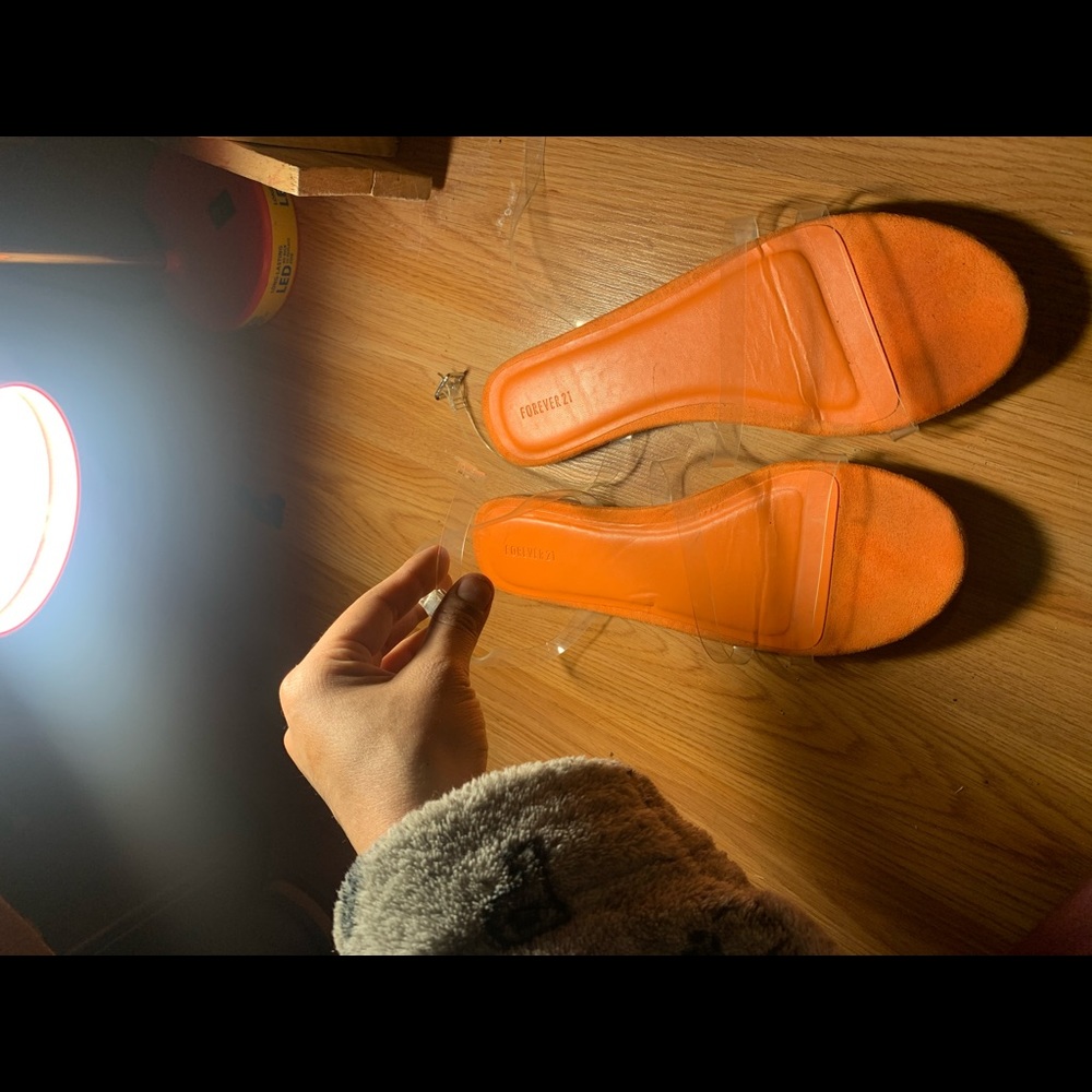 Clear strap sandal . Wraps around ankle